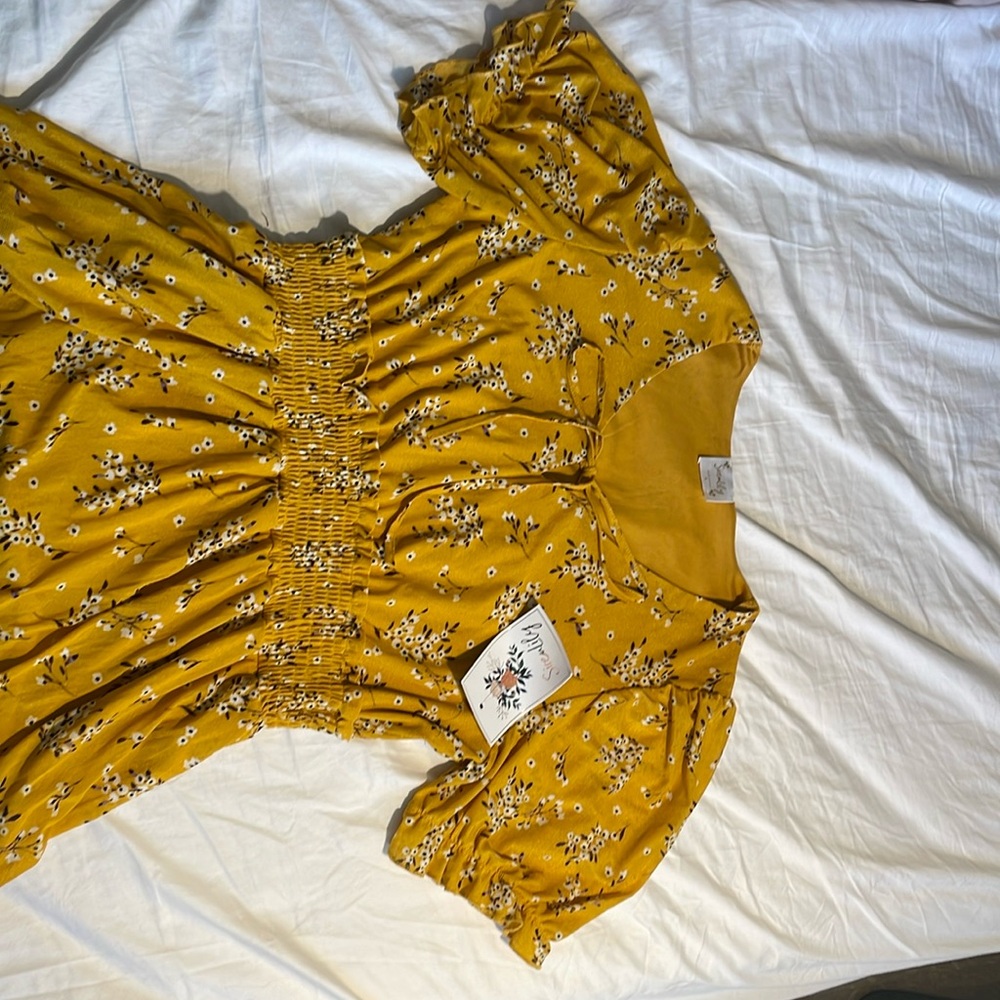 SirenLily yellow, floral dress. Tie at bust, modest puff sleeves, bottom ruffle.